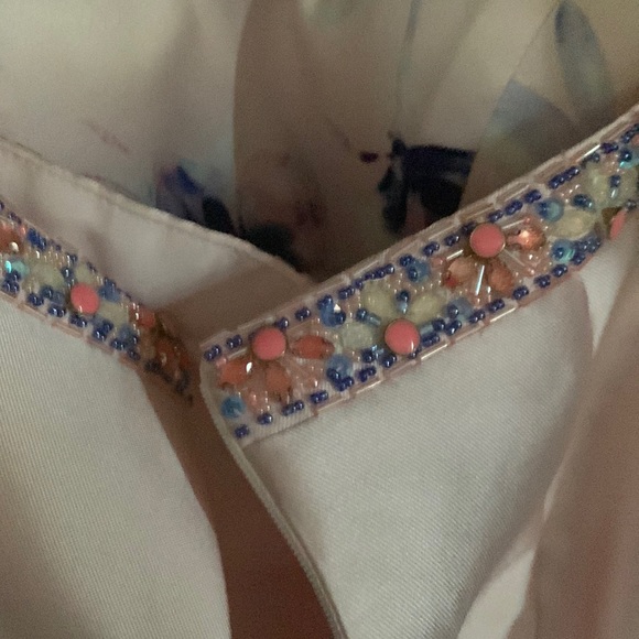 Beautiful unique 2 piece dress. Never worn has tags . Runs a lil small - Picture 5 of 5